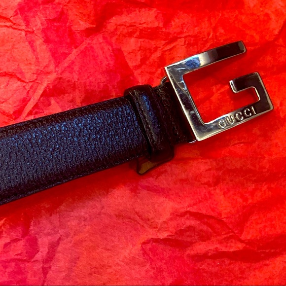 Gucci black leather belt.